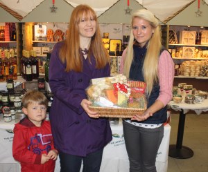 Grace at The Apple Tree Farm Shop presenting Sarah Guest with her hamper